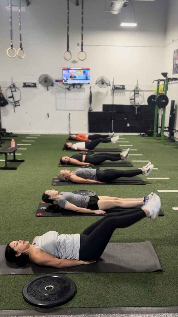 Strong moms working out, group fitness
